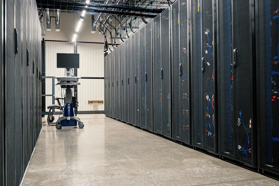 Aisle of servers in a data centre.