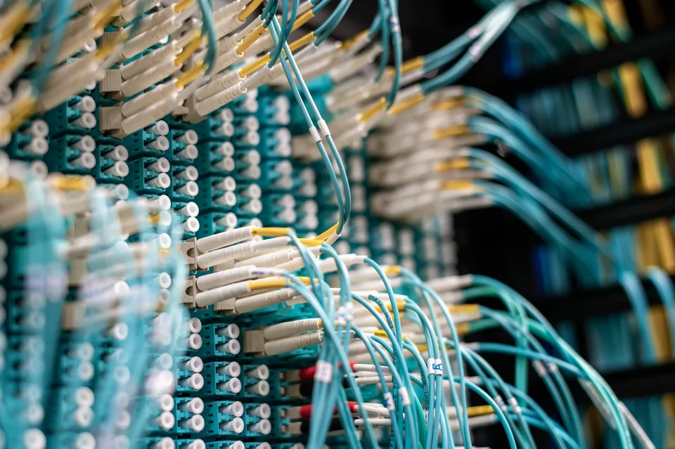 Fibre optic cabling in a network rack.